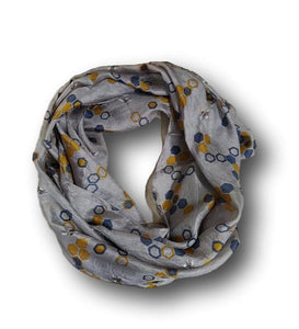 A grey silk scarf with a hexagon design