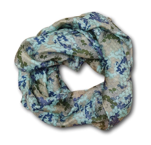 A grey silk scarf with a splatter design