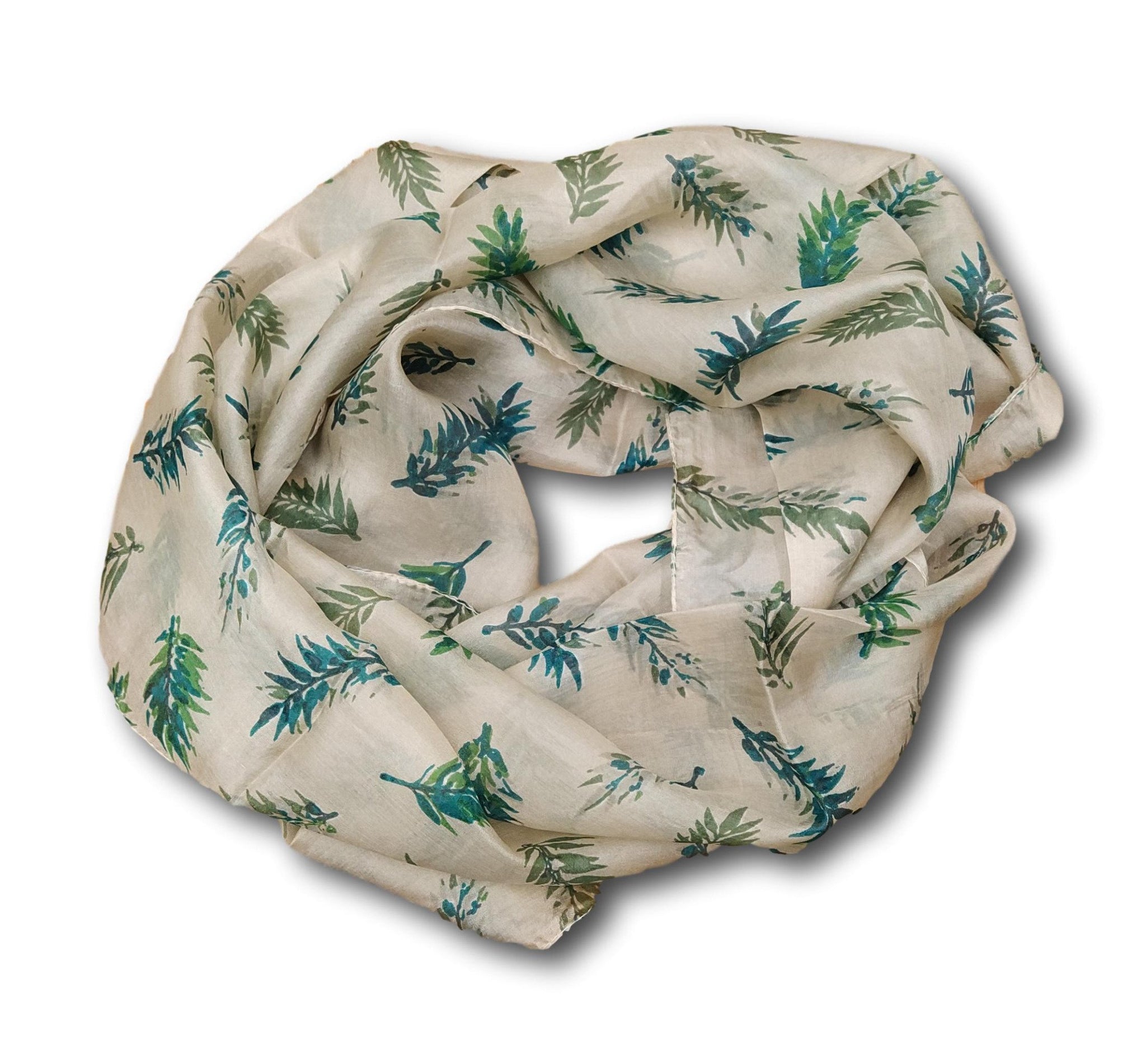 A beige silk scarf with a design of ferns 