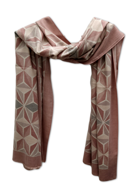 A pashmina weight scarf, with a geometric pattern in grey, cream and pink