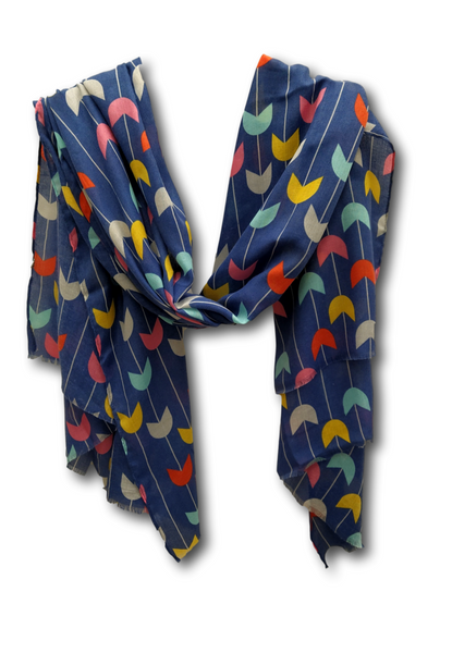 A medium weight scarf in denim blue with a retro design of stylized tulips
